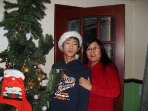 Tianze Ni, who is living at a specialist hospital unit. pictured during a previous Christmas with his mother NIna (photo: Nina Ni).